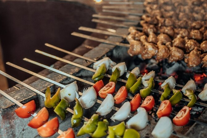 Private Sunset Desert Safari:SandSurfing, Camel Ride & BBQ dinner - Dinner with table service and a live BBQ