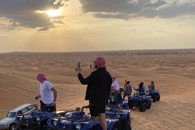 Quad Bike Tour 1 Hr 350 CC Yamaha Sandsurf & Refreshment - Leaving Dubai for the red dunes