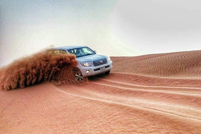 RAK Desert Safari and BBQ Dinner with RAK pick up - Arabic coffee, dates, and a Bedouin-style camp