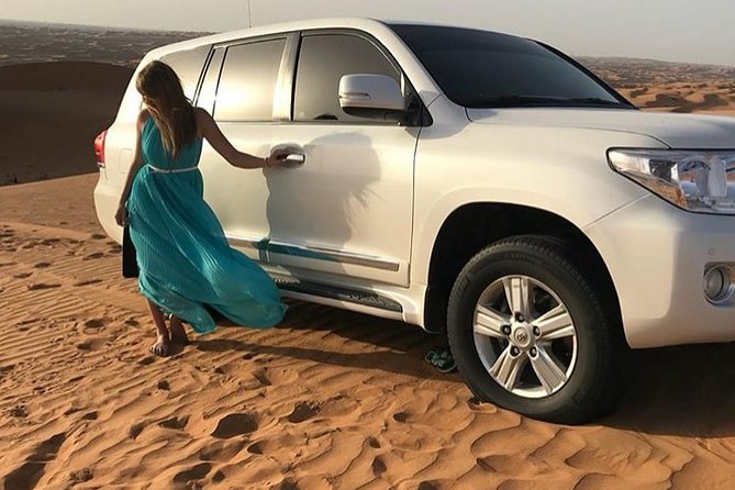 Red Dune 4x4 Desert Safari with Camel ride & BBQ Dinner - Belly dance, fire, and tanura performances