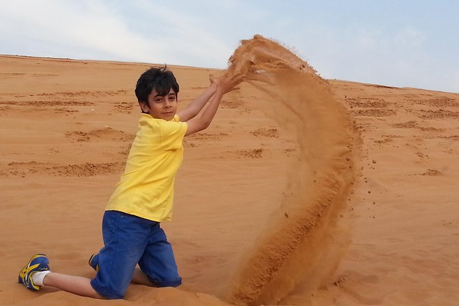 Red Dune Desert Safari & Quad Bike, BBQ Dinner. Camel Ride, Sandboarding - Why Lahbab’s red dunes make this safari special