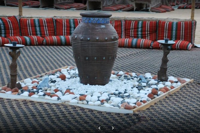 Red Dune Desert Safari & Quad Bike, BBQ Dinner. Camel Ride, Sandboarding - Quad biking needs a close look at the package