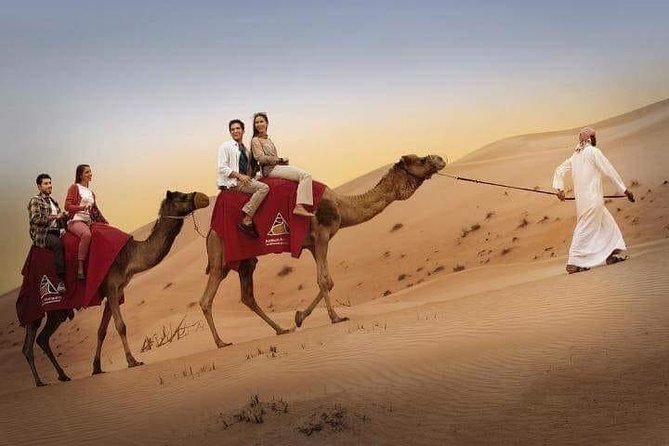 Red Dune Desert Safari with BBQ Dinner, Sand Boarding Dance Shows - Belly dancing, tanoura, and the fire show