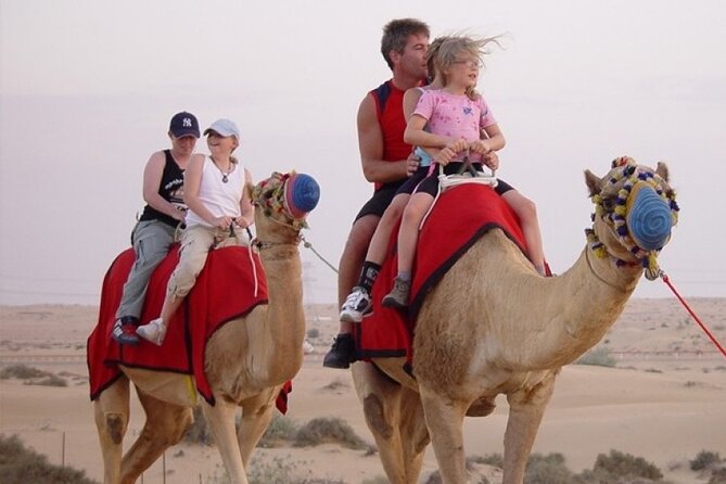 Red Dune Desert Safari with Dinner Quad Bike and Camel Ride - From Dubai pickup to the red dunes of Lahbab