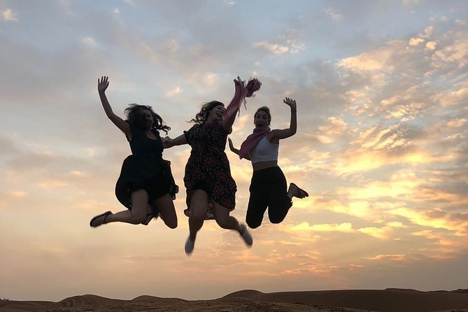 Red Dune evening Desert Safari With BBQ dinner and Camel ride - Sandboarding adds an easy desert activity