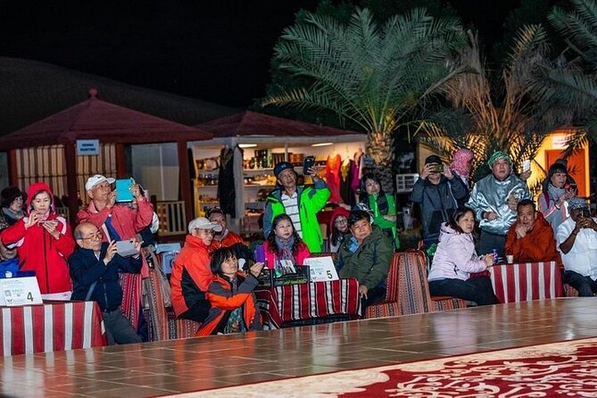 Red Dunes Desert Safari with 4x4 Pick up & Drop, Camel ride, BBQ and Live shows - Belly dance, fire, and Tanoura performances