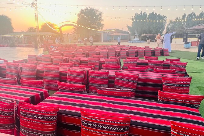 Red Dunes Safari Dubai Tour with Camel Ride, BBQ and Live Shows - Belly Dancing, Tanoura, And Fire Performance