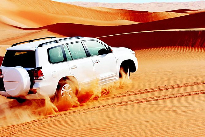 Red Dunes Safari with Sandboarding & Camel Ride from Ras Al Khayma - From Ras Al Khaimah to the Red Dunes