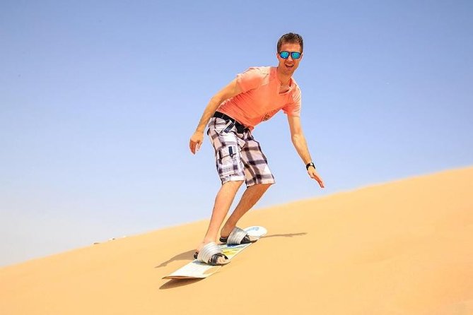 Red Dunes Safari with Sandboarding & Camel Ride from Ras Al Khayma - Sandboarding gives you time on the sand