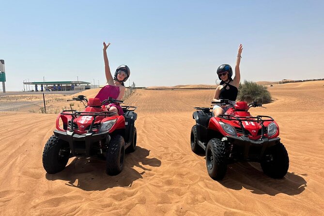 Red dunes Sunset Desert Safari With Quad Bike option & Camel Ride - Dune bashing across the sand