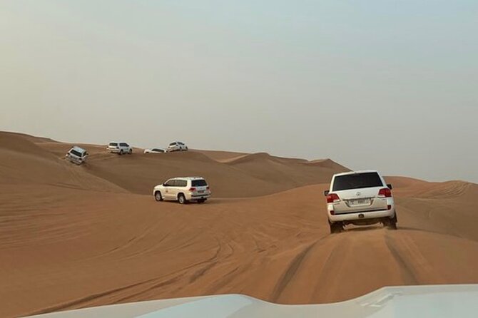 Red Sand Tourism desert safari with premium camp - A 20 to 30 minute sunset and sandboarding stop