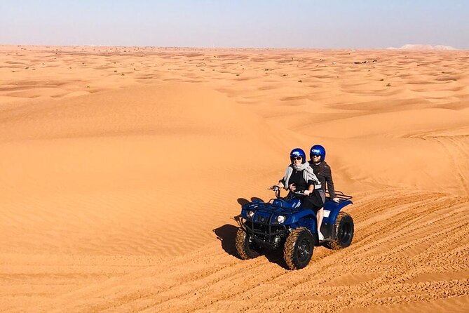 Self Drive Quad Bike in Open Desert With Sand Boarding and Camels - Sandboarding after the ride