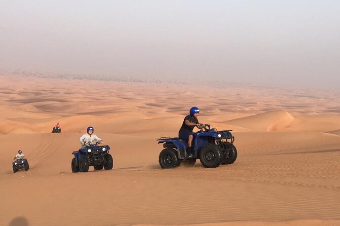 Self Drive Quad Bike in Open Desert With Sand Boarding and Camels - What the $68.38 price includes