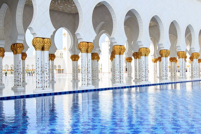 Sheikh Zayed Mosque Half Day Tour in Abu Dhabi - White marble, floral patterns, and courtyard scale