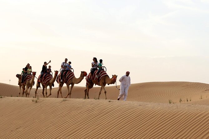 Sunset Camel Trek & Red Dunes Safari with BBQ at Al Khayma Camp From Dubai - BBQ dinner beneath the evening sky