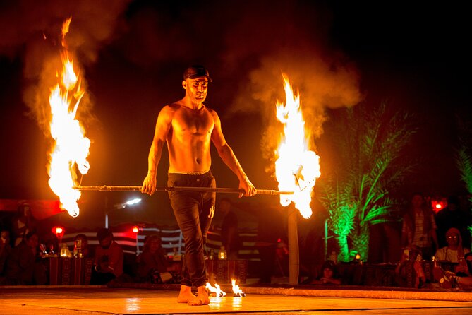 Sunset Camel Trekking with Falcon Show & VIP BBQ Dinner - Tanura and Belly Dance Bring the Camp to Life