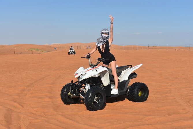 Sunset Desert Safari Quad bike Camel ride Sand Board & BBQ Dinner - A full evening from Dubai to the desert