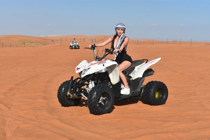 Sunset Desert Safari Quad bike Camel ride Sand Board & BBQ Dinner - Moving from adrenaline to the Al Awir camp