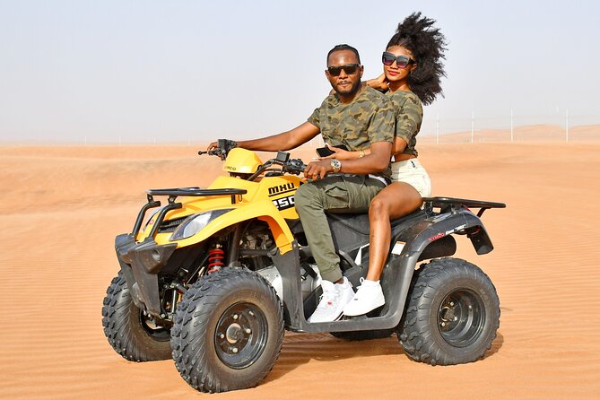 Sunset Desert Safari Quad bike Camel ride Sand Board & BBQ Dinner - Transport, group size, and the practical details