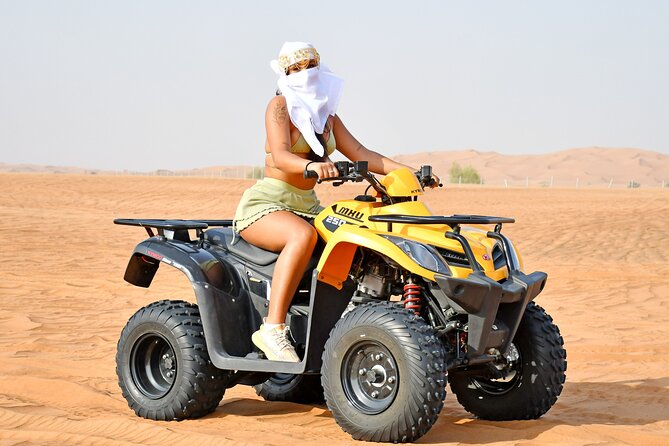 Sunset Desert Safari Quad bike Camel ride Sand Board & BBQ Dinner - Who will get the most from this safari