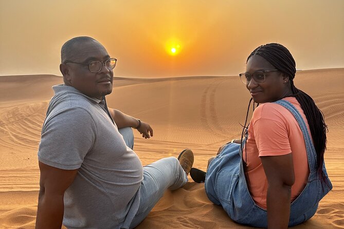 Sunset Desert safari with Camel Ride Sand Board & BBQ Dinner - Camp activities after dark