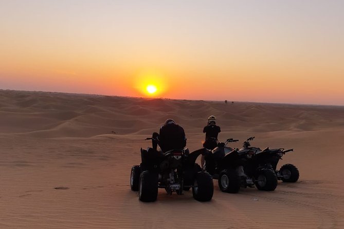 Sunset Quad Bike Tour Dubai (Deep desert ride , sunset in desert) - Riding Into the Desert From Big Red