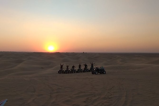 Sunset Quad Bike Tour Dubai (Deep desert ride , sunset in desert) - Booking, Clothing, and Cancellation Details