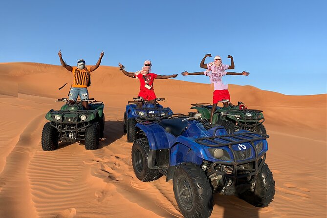 Sunset Quad/Buggy Tour & BBQ Evening - From Dubai pickup to the red dunes
