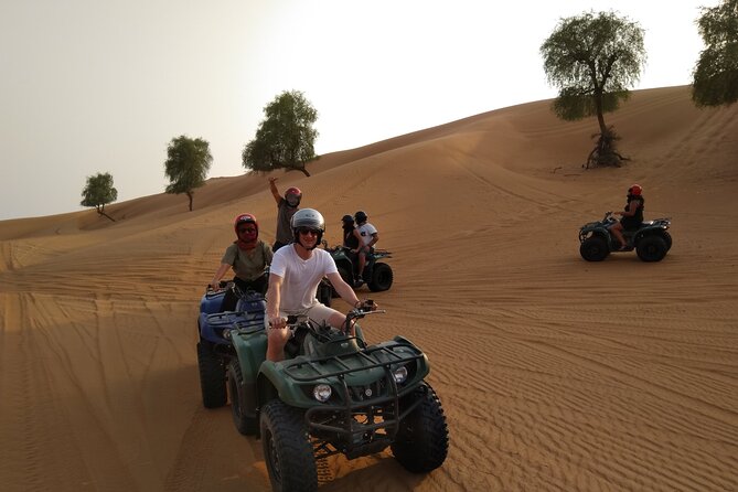 Sunset Quad/Buggy Tour & BBQ Evening - Sandboarding on the red dunes