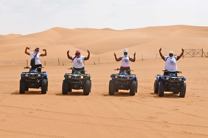 Sunset Quad/Buggy Tour & BBQ Evening - A short camel ride for the classic desert photo