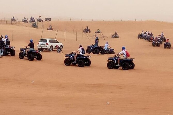 Ultimate Desert Experience Quad Bike, Sandboarding, Camel Ride - Tanoura, Fire, Belly Dance, and Khaliji Performance