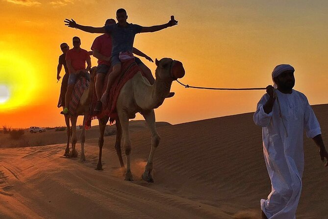 Ultimate Desert Experience Quad Bike, Sandboarding, Camel Ride - Quad Biking Across the Red Dunes