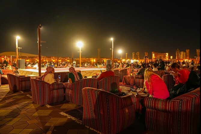 VIP Camp at Red Sand Safari with BBQ Dinner and ATV Ride - Sandboarding above the red sand