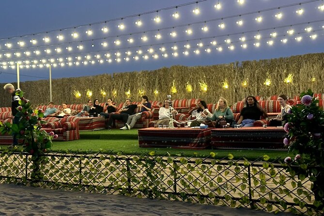 VIP Desert Safari Abu Dhabi with Private Seating Area - Arabic costumes, falcon photographs, and camp activities
