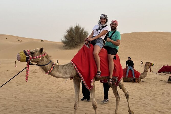 VIP Desert Safari, ATV, BBQ, Camel Ride, All Exclusive Services - Dune Bashing, Sandboarding, and Desert Photographs