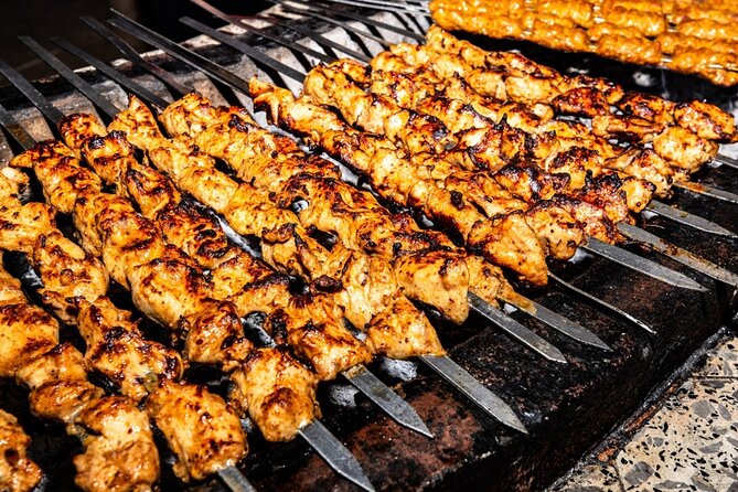 Vip Desert Safari Dubai with Camel Riding BBQ Dinner & Live Shows - A short camel ride, sandboarding, and camp activities