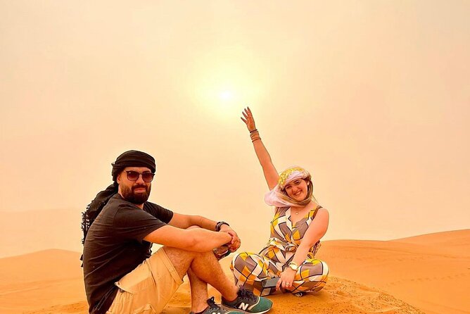 VIP Dubai Desert Safari with Quadbike,Sandboarding & BBQ dinner - Sunset photos, camel rides, and traditional dress