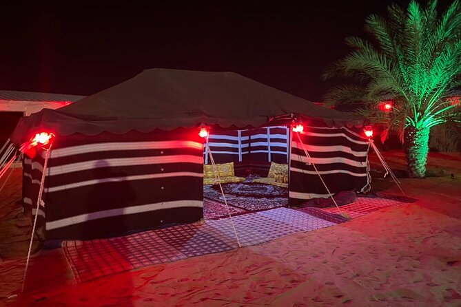 VIP Evening Desert Safari with Camel Ride & BBQ Dinner–Shared Car - Sandboarding on the red dunes